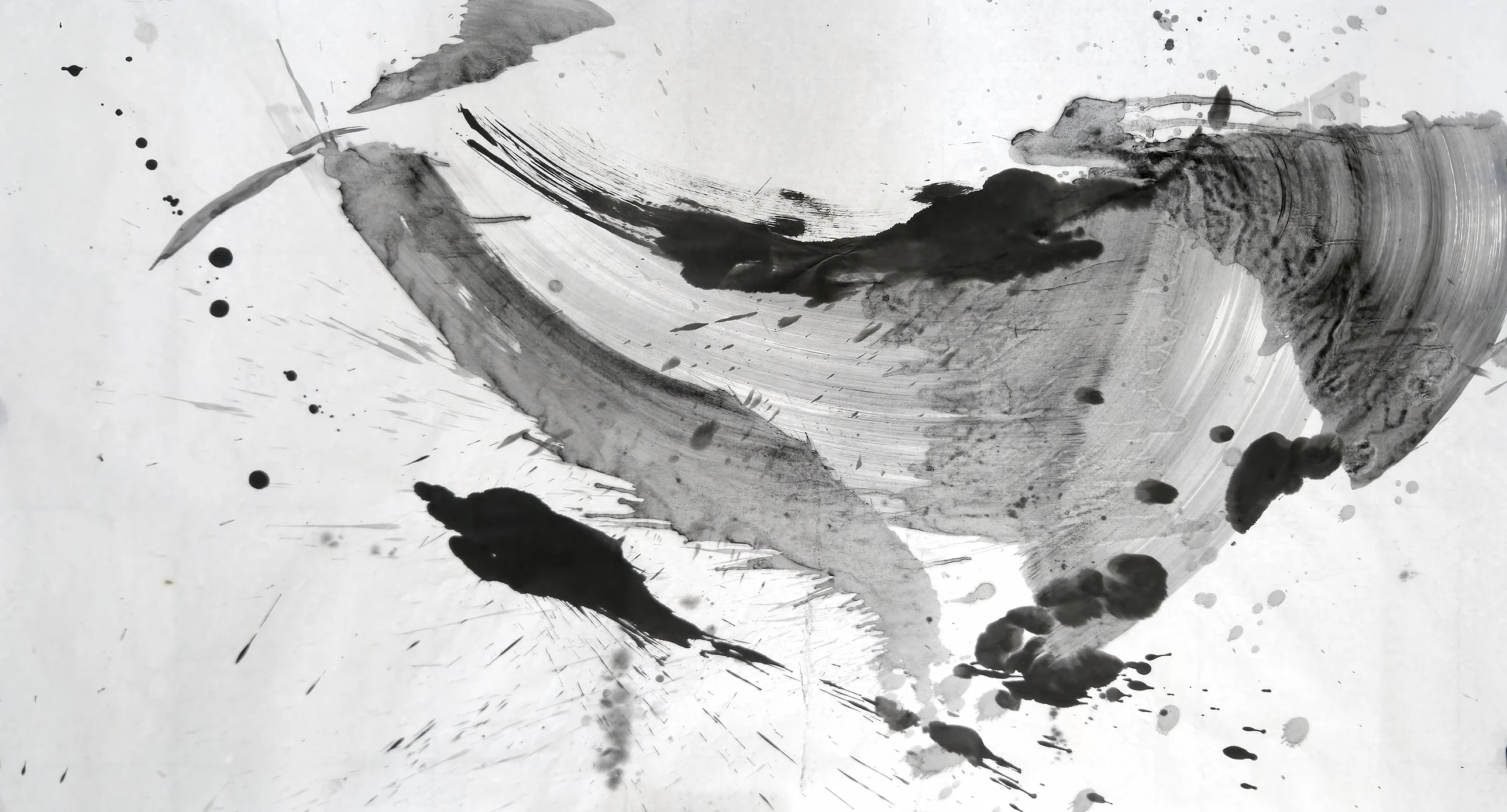 A wide grey curved brushstroke sweeping across pale paper, a striated grey fan at right, black blots below, scattered ink spatter.