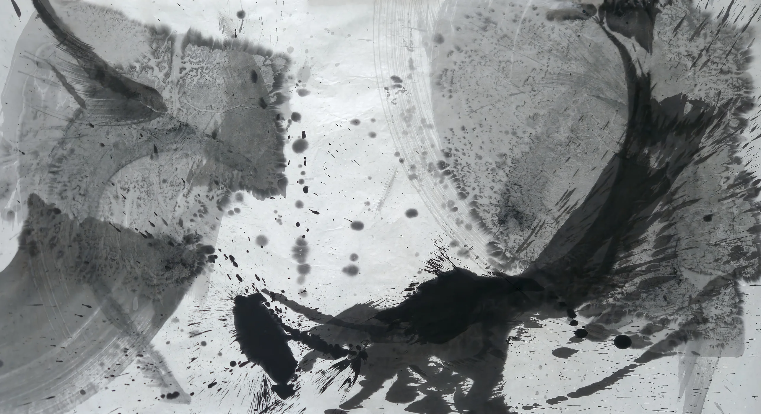 Wide ink painting: grey wash slabs and a pale ring at left, a dark curving stroke rising right, black blots and spatter below centre.