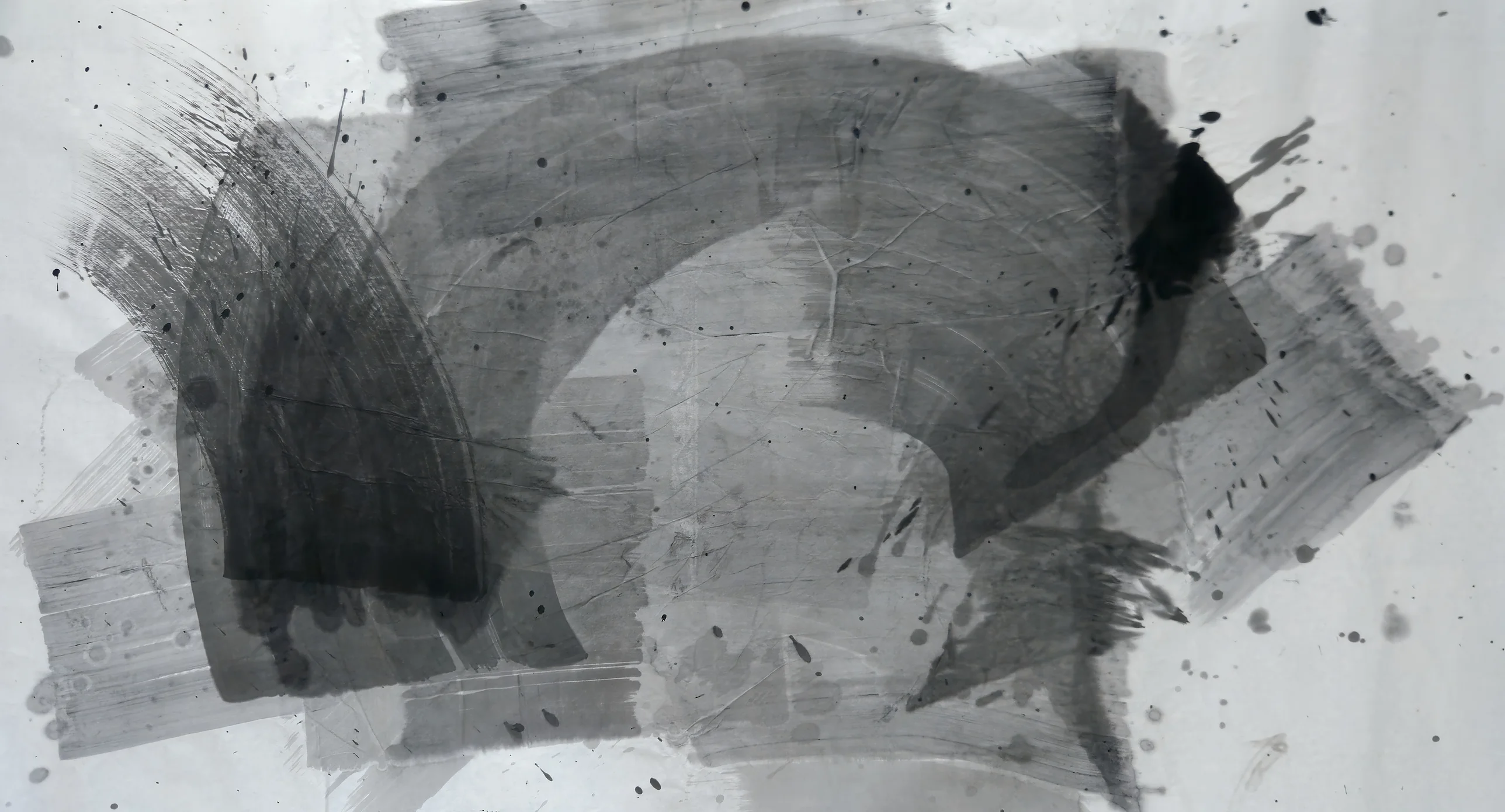 Grey and black ink strokes on pale paper: a dark curved band at left, a wide grey arc across the top, a black blot upper right.