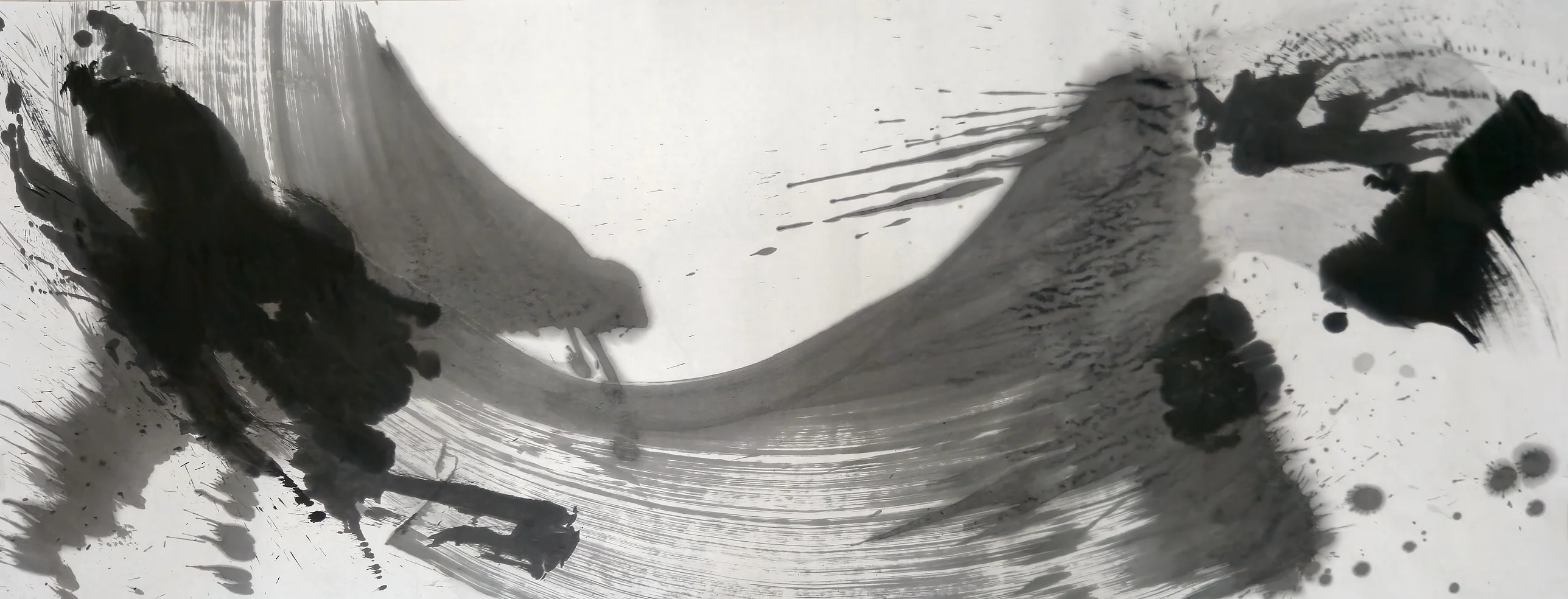 Wide sheet: a grey U-shaped brushstroke sweeps across the bottom, between a large black mass at left and dark blots at right.