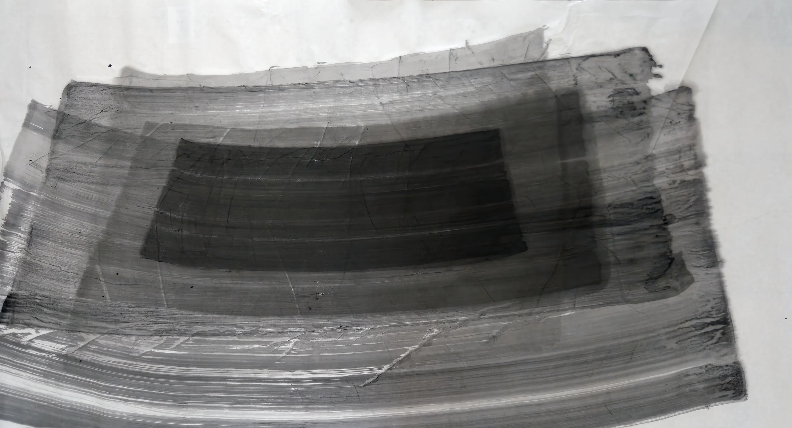 Wide horizontal grey brush bands, nested and gently bowed, stepping darker toward a dark rectangle at centre, with bare paper along the top.