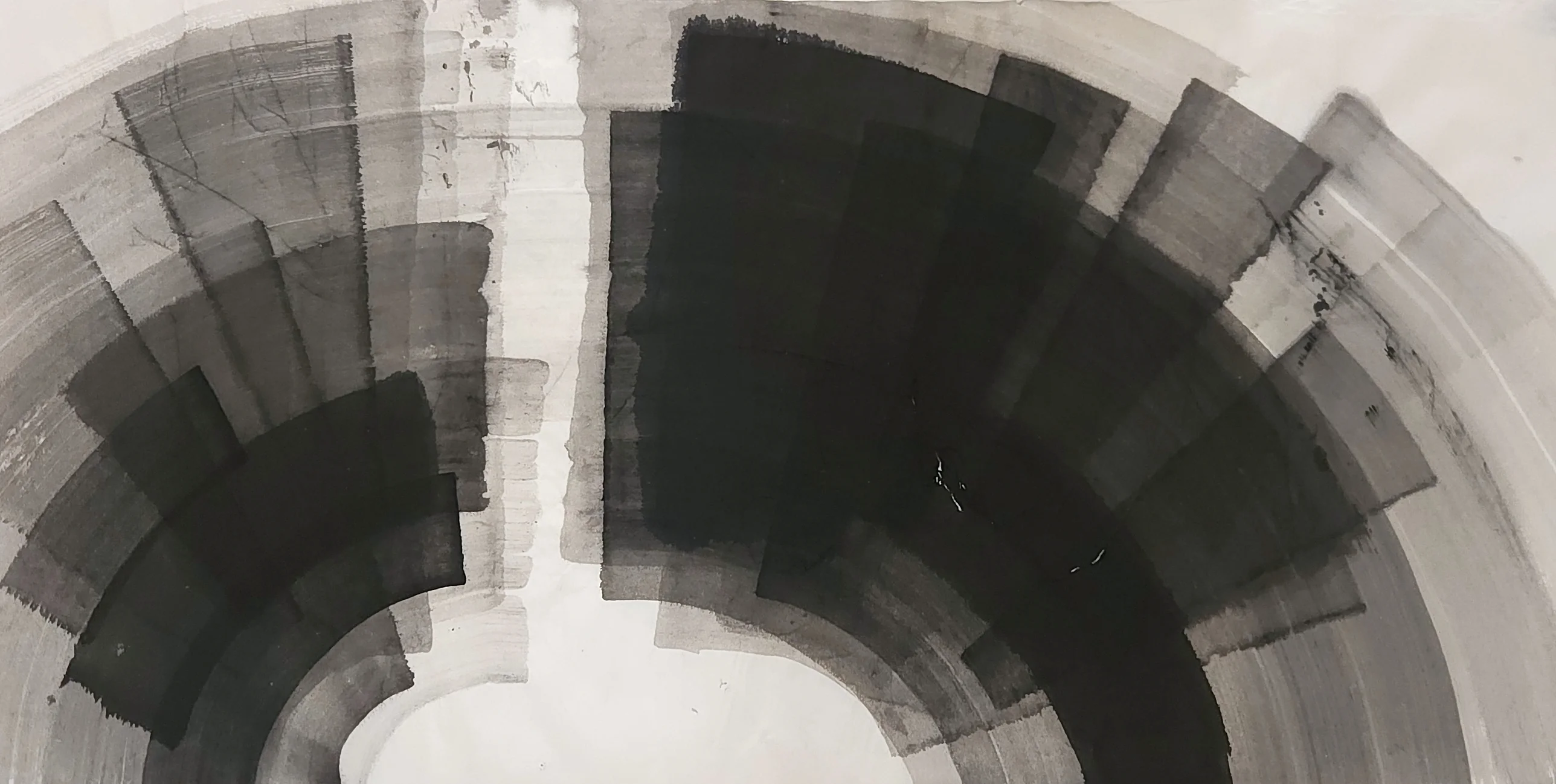 Wide grey and black brush blocks form a large arch, split left of centre by a vertical white channel above a white void.