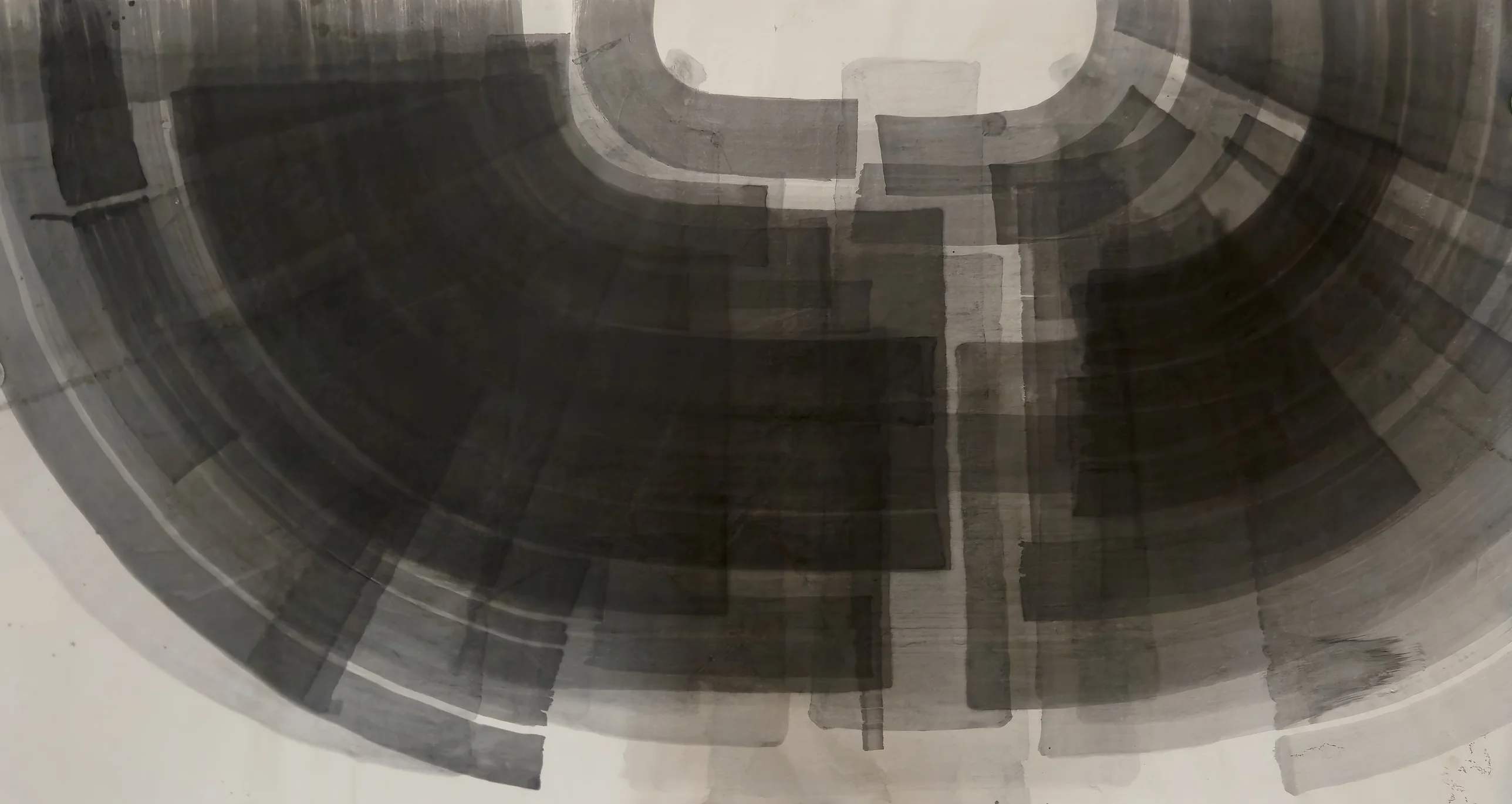 A wide horseshoe of overlapping grey and black ink bands around a rounded white opening at top centre, with squared dark columns down the middle.