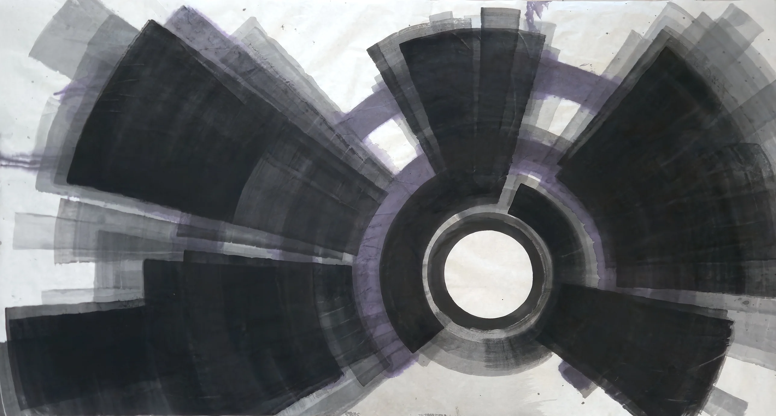 Black and grey wedges radiate from a white circle right of centre on a wide pale sheet, a faint violet arc behind them.