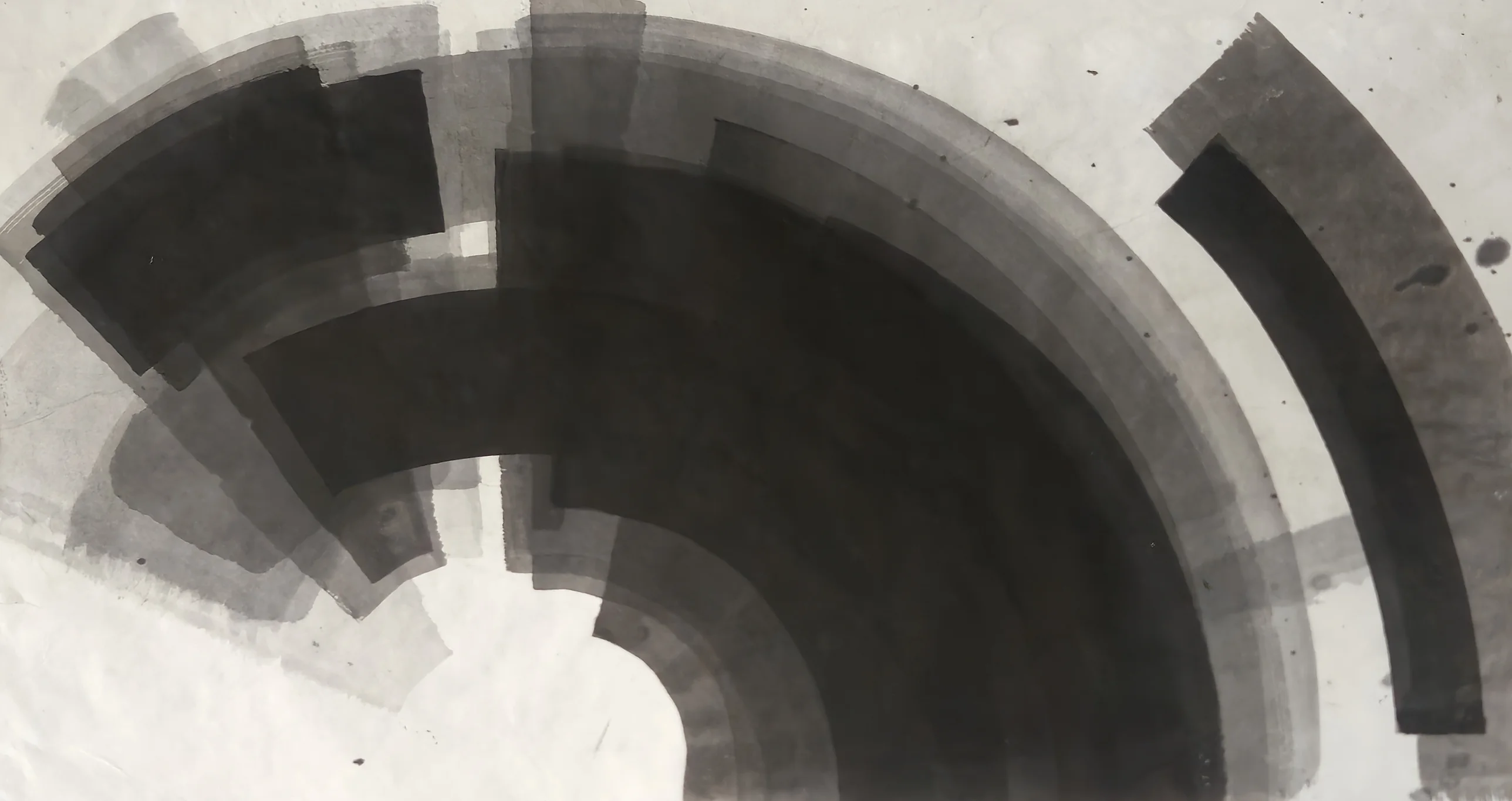 Broad black and grey concentric arcs curve from upper left down to bottom centre around a white half-circle, with a separate grey arc at right.
