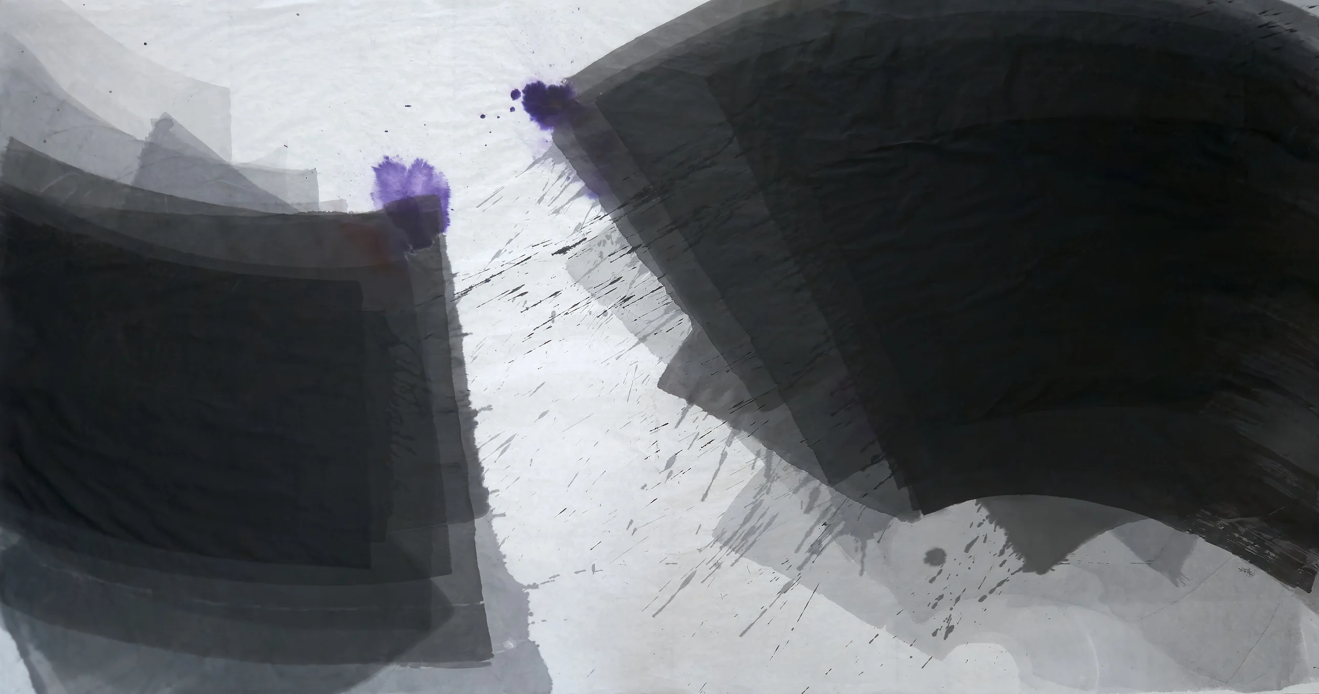 Two large layered black and grey masses, a square at left and a rising fan at right, split by white paper, spatter and violet drops.
