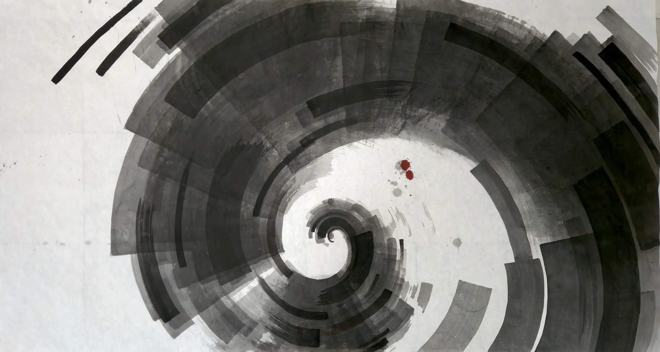 Broad grey and black curved bands form a large spiral winding into a small coil, with two red drops and open paper left.