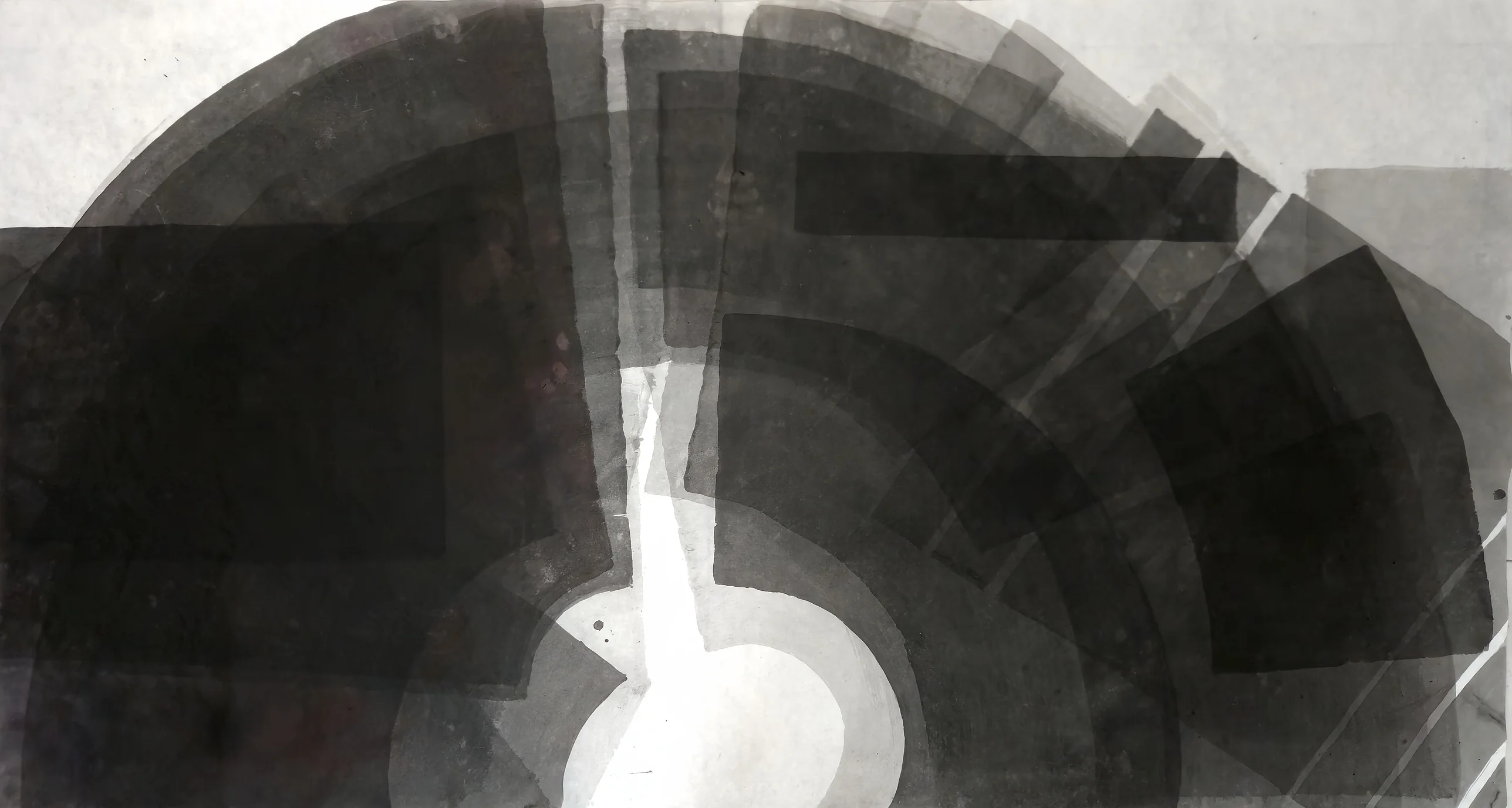 Dark overlapping ink shapes form a dome: a heavy black rectangle at left, fanned grey arcs at right, around a white circle at bottom centre.