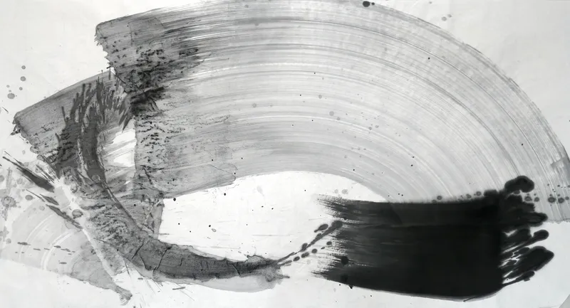 T_199: A wide streaked grey arc sweeps over a pale sheet to a black block at lower right, with grey strokes and spatter at left.