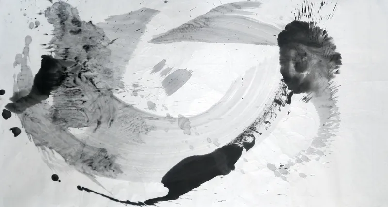 T_200: Wide ink painting: a pale grey brushed ring circles an open centre, with dark masses at left, upper right and bottom, and scattered spatter.