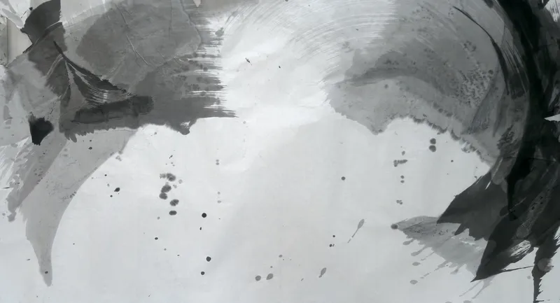T_222: Grey washes upper left, jagged black mass at the right edge, a pale arc across the top, dark drips scattered over an empty pale centre.