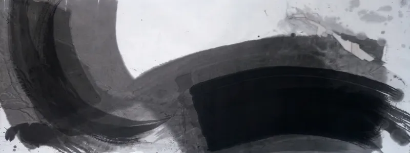 T_257: Wide grey ink crescent on the left curving into a grey band across the right, a dense black block lower right, white paper top centre.