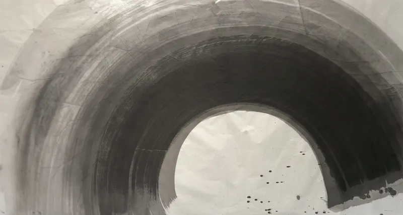 T_276: A wide black and grey arc sweeps across pale paper around a rounded white opening, with ink drops and a pale blot lower right.