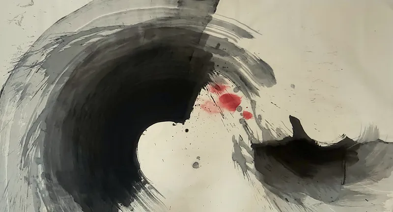 T_317: Large black crescent on the left curving around white paper, grey sweeps outside it, red spots at centre, a dark mass lower right.