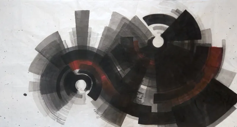 T_367: Two large circular ink forms of radiating grey and black blades, joined by a dark curving band with red, heavier toward the right.