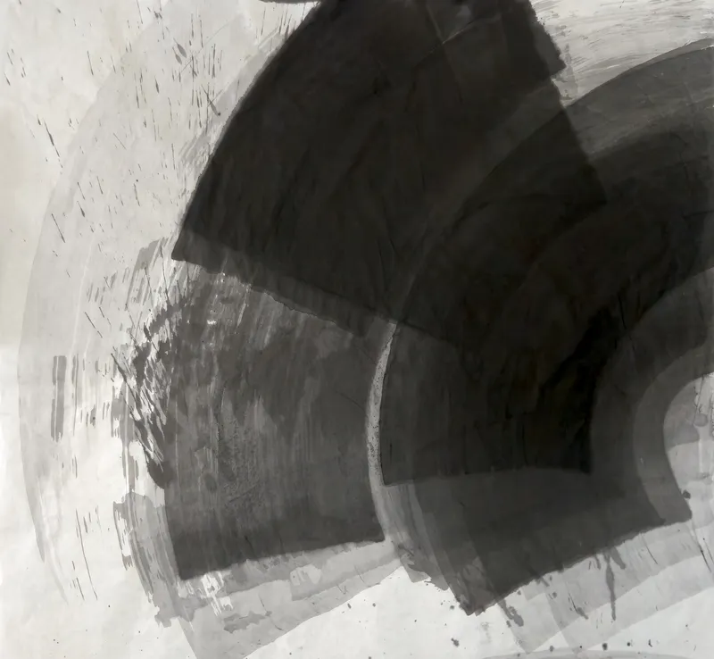 T_377: Broad dark and grey arc-shaped bands fan out from the right edge across pale paper, with spatter and faint rings at upper left.
